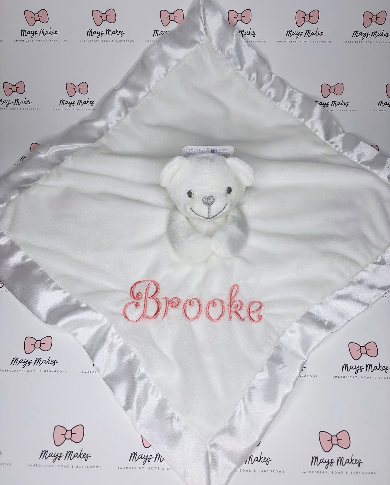 Embroidered Comfortor (white, blue, pink)