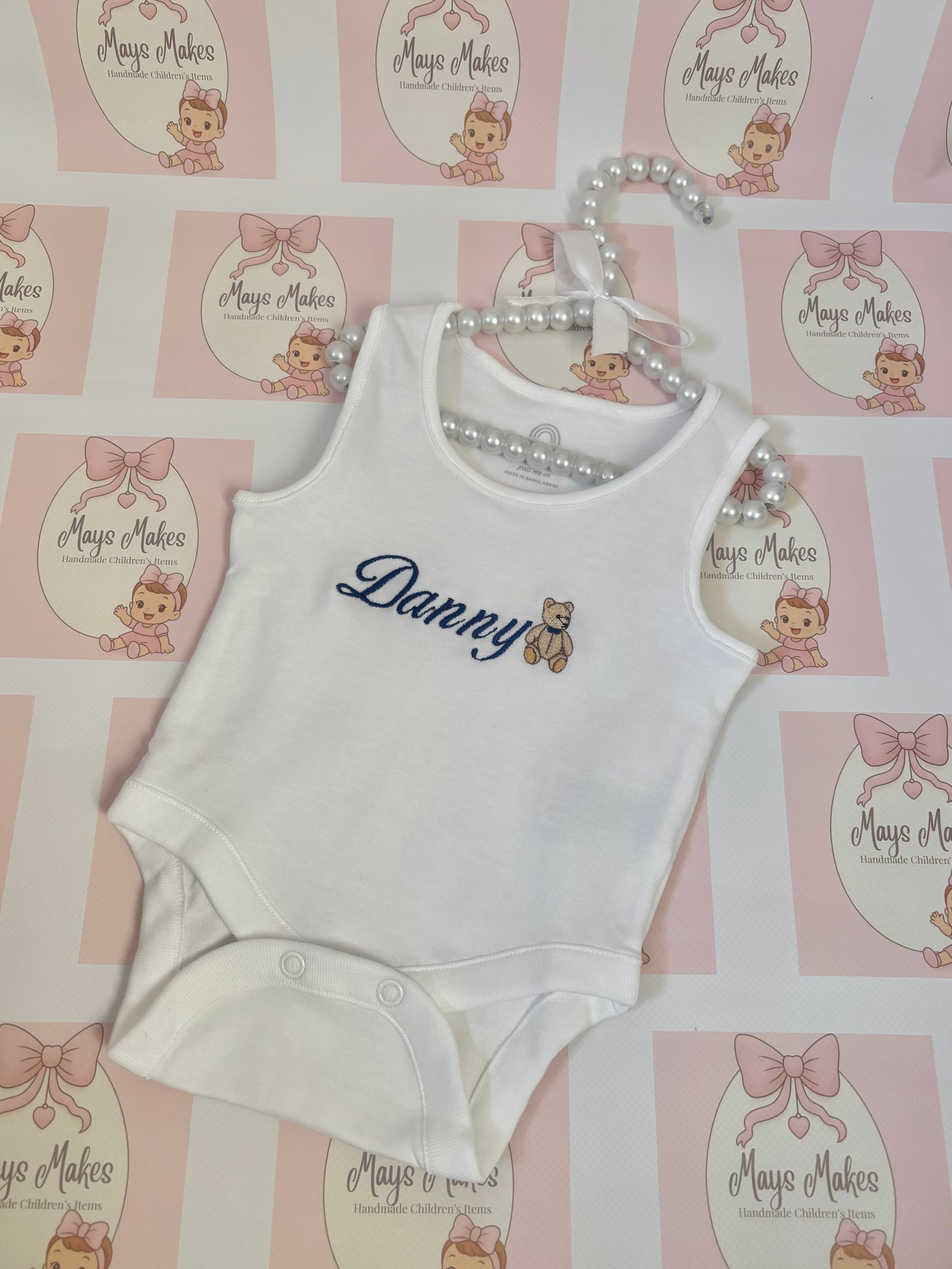 Embroidered Vest with Bear